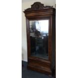 A Continental ,mahogany single drawer wardrobe wit