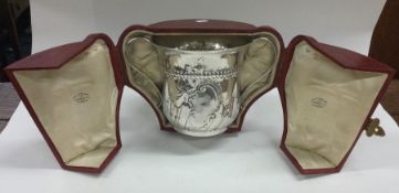 A rare George III silver porringer of half fluted