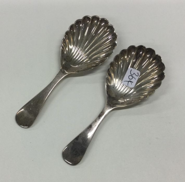 A pair of OE pattern silver caddy spoons with flut