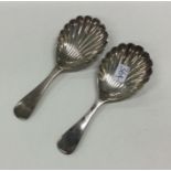 A pair of OE pattern silver caddy spoons with flut