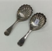 A pair of OE pattern silver caddy spoons with flut