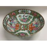 A Chinese Canton fruit bowl decorated in bright co