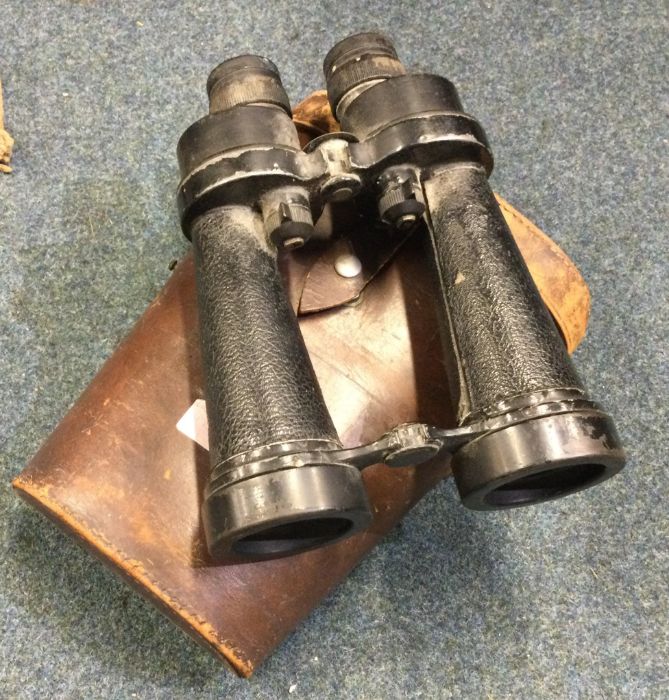 A large pair of Barr & Stroud binoculars in leathe