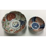 Two Chinese Imari fruit bowls. Est. £20 - £30.