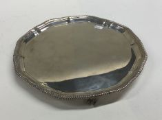 An Edwardian silver waiter with gadroon rim. Birmi