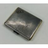 A German silver and silver gilt cigarette case mou