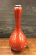 A good red enamel and silver baluster shaped vase