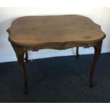A large Continental mahogany occasional table with