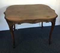A large Continental mahogany occasional table with