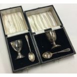 Two boxed silver christening sets. Birmingham. Est