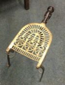 An old brass mounted kettle trivet. Est. £20 - £30