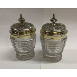 An attractive pair of cut glass preserve jars with