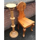 A pine hall chair together with a pedestal. Est. £