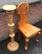 A pine hall chair together with a pedestal. Est. £