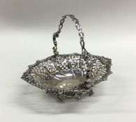 A good Georgian silver swing handled basket with p