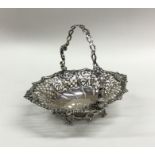 A good Georgian silver swing handled basket with p