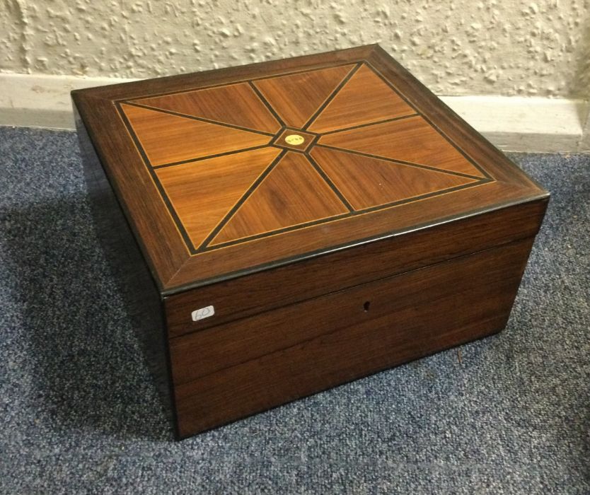 An olive wood mounted trinket box with fitted inte