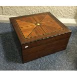 An olive wood mounted trinket box with fitted inte