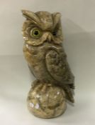 A large hardstone figure of an owl in seated posit