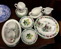 A large Royal Worcester 'Herb' pattern part dinner