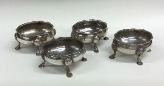 A rare set of four Georgian silver salts of oval f