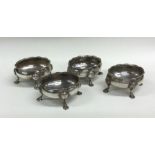 A rare set of four Georgian silver salts of oval f