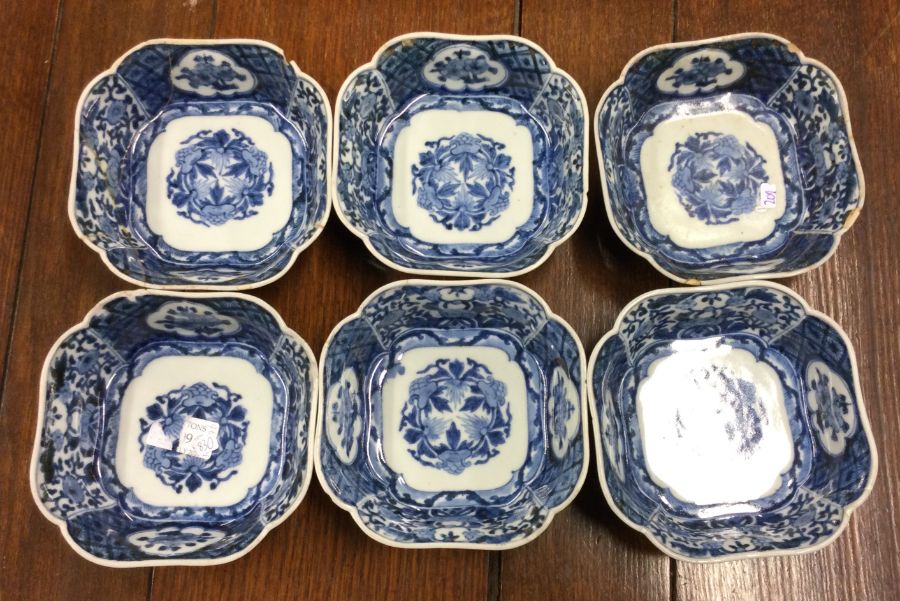 A group of six Chinese soup bowls decorated in bri