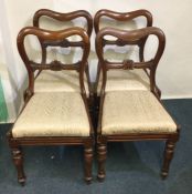 A set of four Victorian hoop back chairs with slip