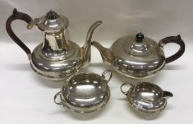 A heavy silver four piece tea service. London. By