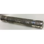 A large Judaica silver scroll holder profusely dec