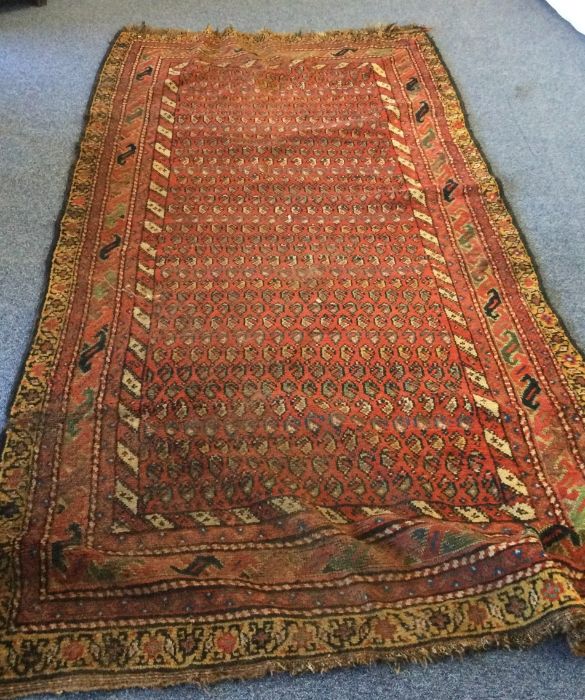 A large runner decorated in bright colours. Est. £ - Image 2 of 3