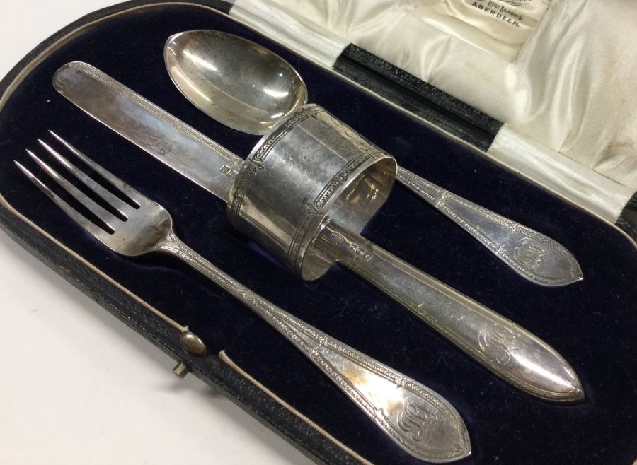 A heavy cased silver three piece christening set. - Image 2 of 4