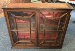 A good Georgian mahogany display cabinet. Est. £30