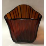 A large shaped amber glass vase. Est. £20 - £30.