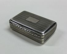 A Georgian silver reeded snuff box with hinged lid