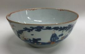 A good Chinese bowl decorated with figures and flo