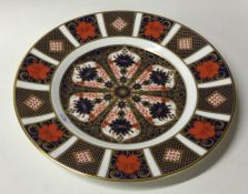A Royal Crown Derby plate. Pattern Number 1128. Es