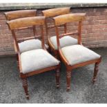 A good set of four Victorian hoop back chairs with