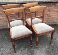 A good set of four Victorian hoop back chairs with