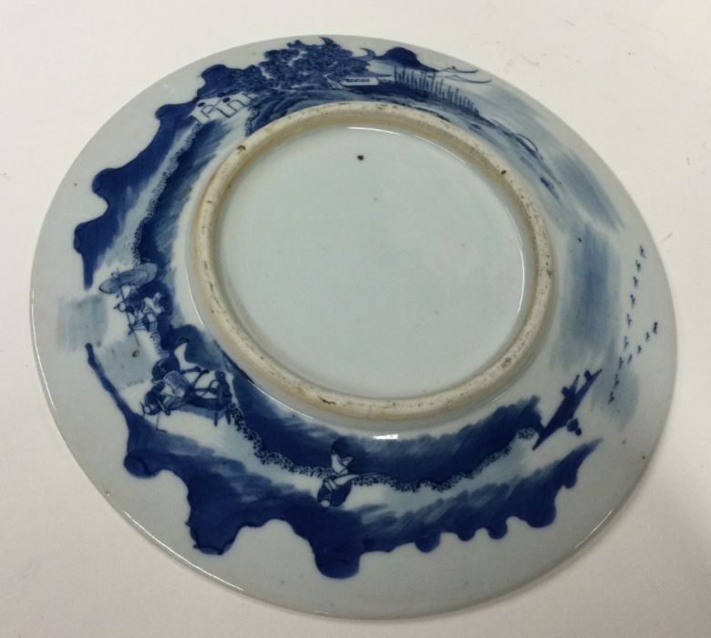 A Chinese blue and white plate decorated with flow - Image 2 of 2