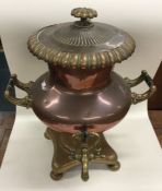 An old heavy copper samovar. Est. £30 - £50.