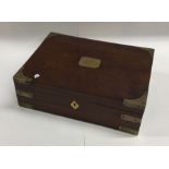 A brass mounted box with inlaid decoration. Est. £