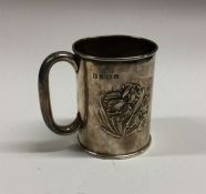 An Edwardian silver christening cup with floral de