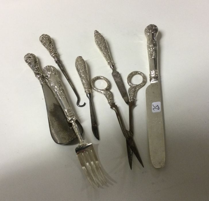 A collection of chased silver scissors, manicure i