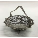A good Georgian cast silver basket with pierced bo