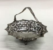 A good Georgian cast silver basket with pierced bo