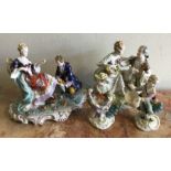 A collection of decorative porcelain figures in br