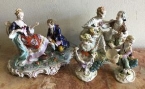 A collection of decorative porcelain figures in br