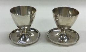 A heavy pair of Edwardian silver eggcups. Sheffie