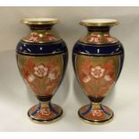 A stylish pair of Macintyre vases decorated in blu
